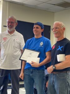 Shown receiving a TRAACA Scholorship is Elijah Carlton pictured with Pres. Bob Skrob and Lively Alum Craig Brown.