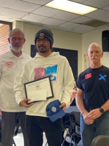 Estevan Mendoza, Lively Tech student is pictured receiving a TRAACA Scholorship. Pictured with him is Pres.. Bob Skrob and Lively Tech Alum, Craig Brown